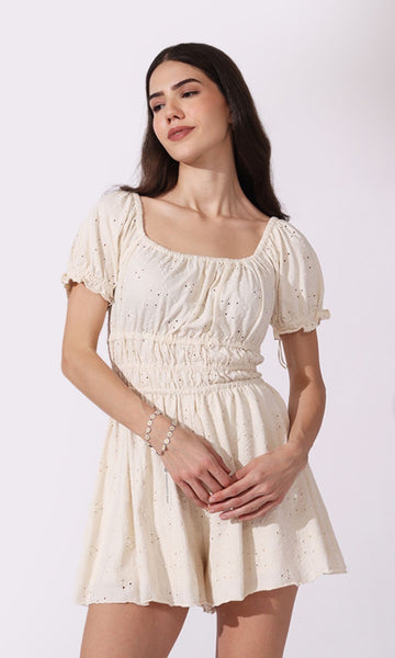 The beige embroidered romper dress